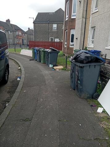 17 knockhill rd bins on pavement.